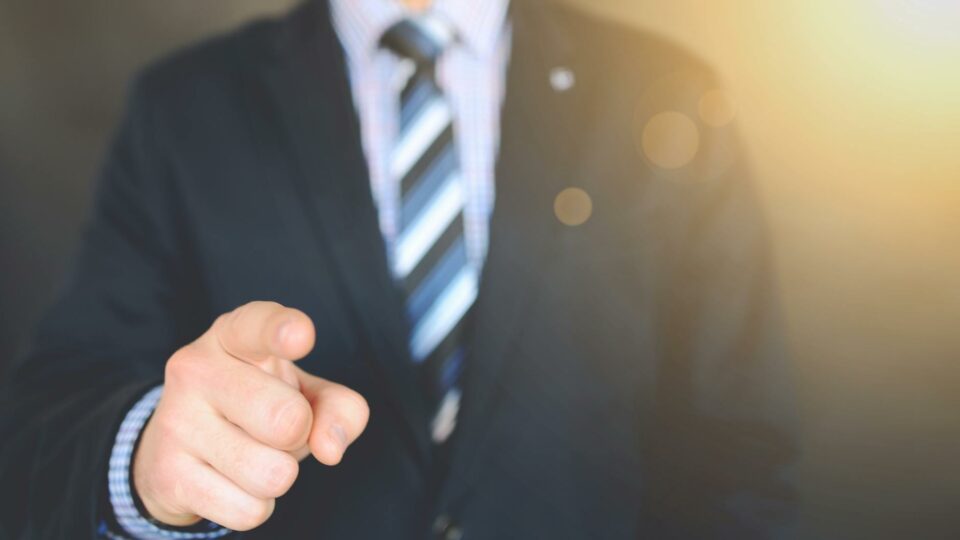 close up photo of a person wearing suit jacket