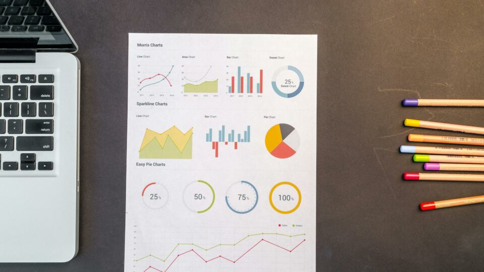 charts on black wooden table