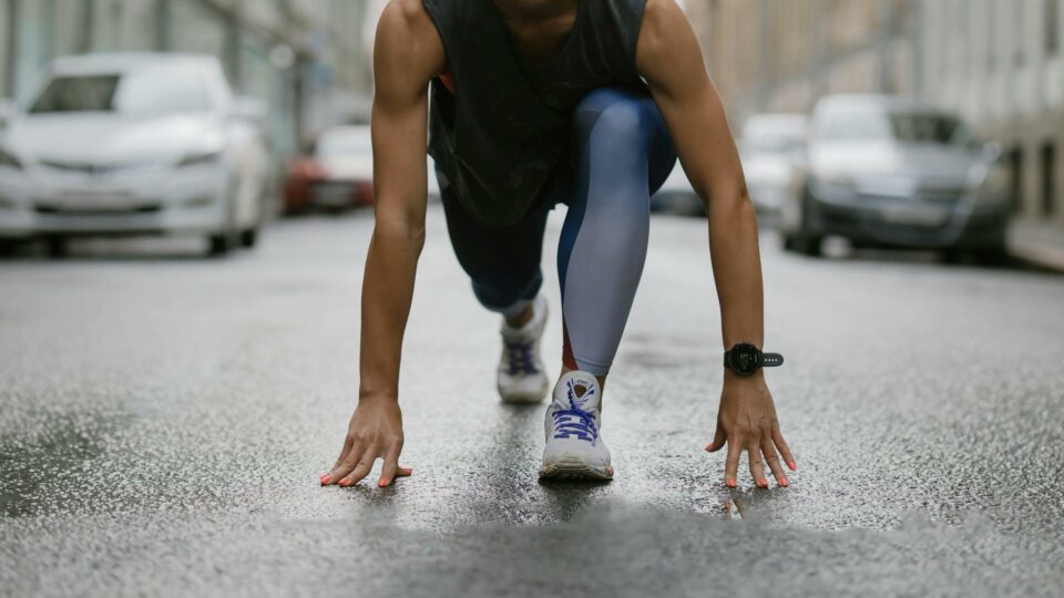 a woman getting ready to run